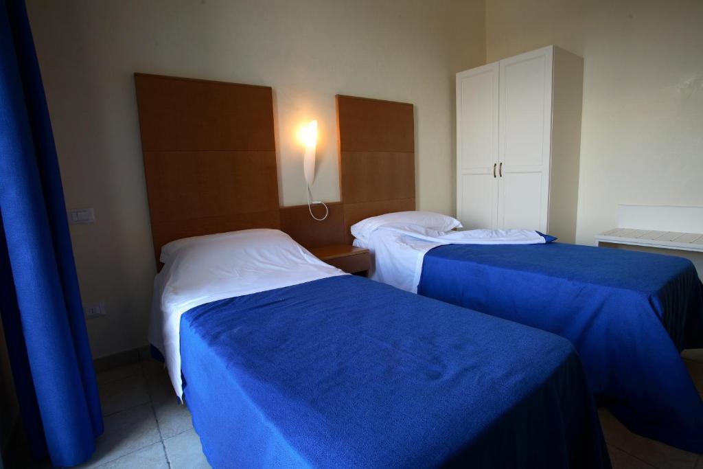 Hotel Resort Portoselvaggio Sant Isidoro  Δωμάτιο φωτογραφία